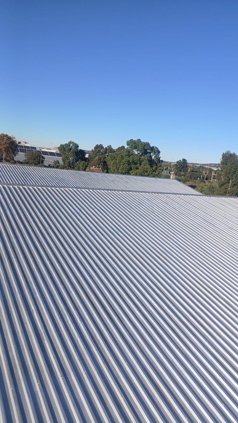 Roof coating application 1